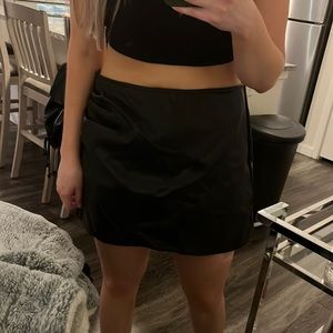 Black faux leather skort